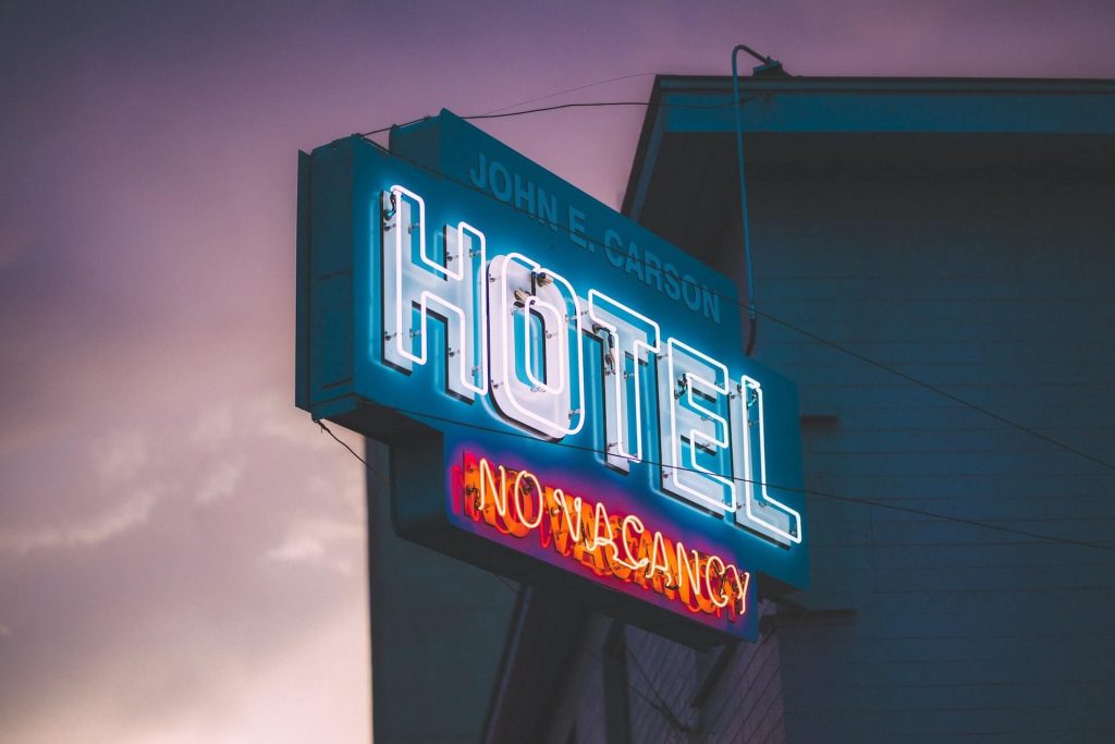 neon sign that says hotel