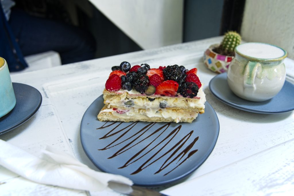 Berry Layer Cream Cake At Geros Cafe