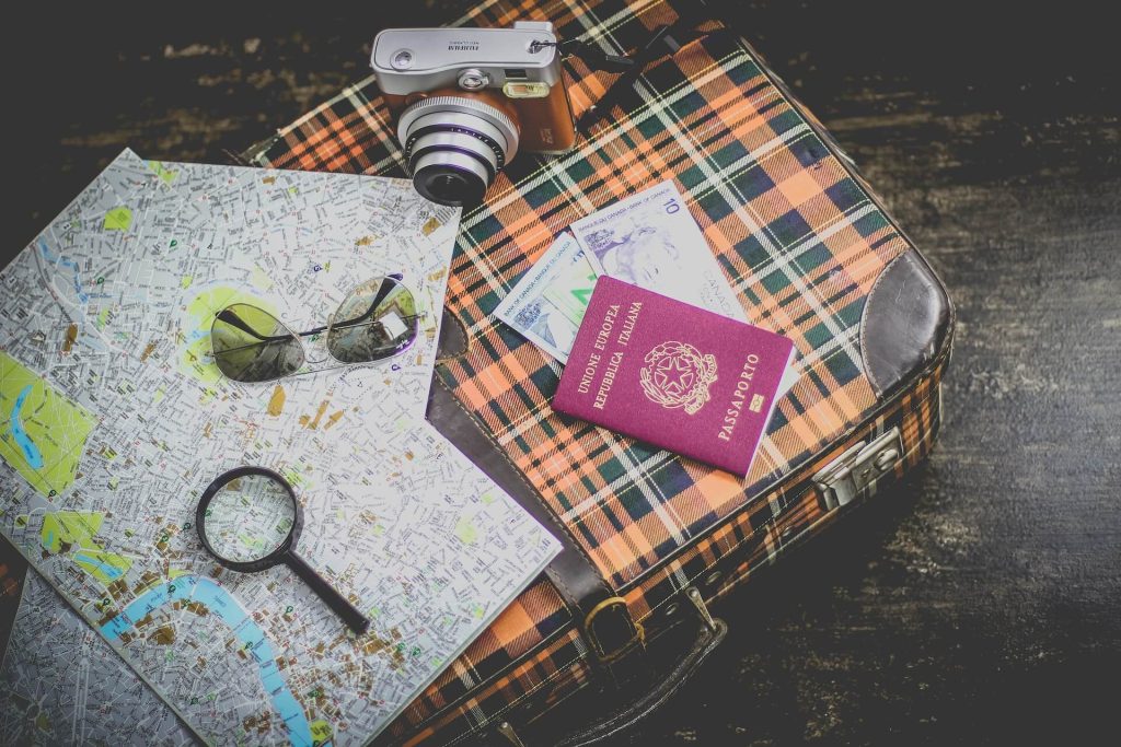 map and passport on a table