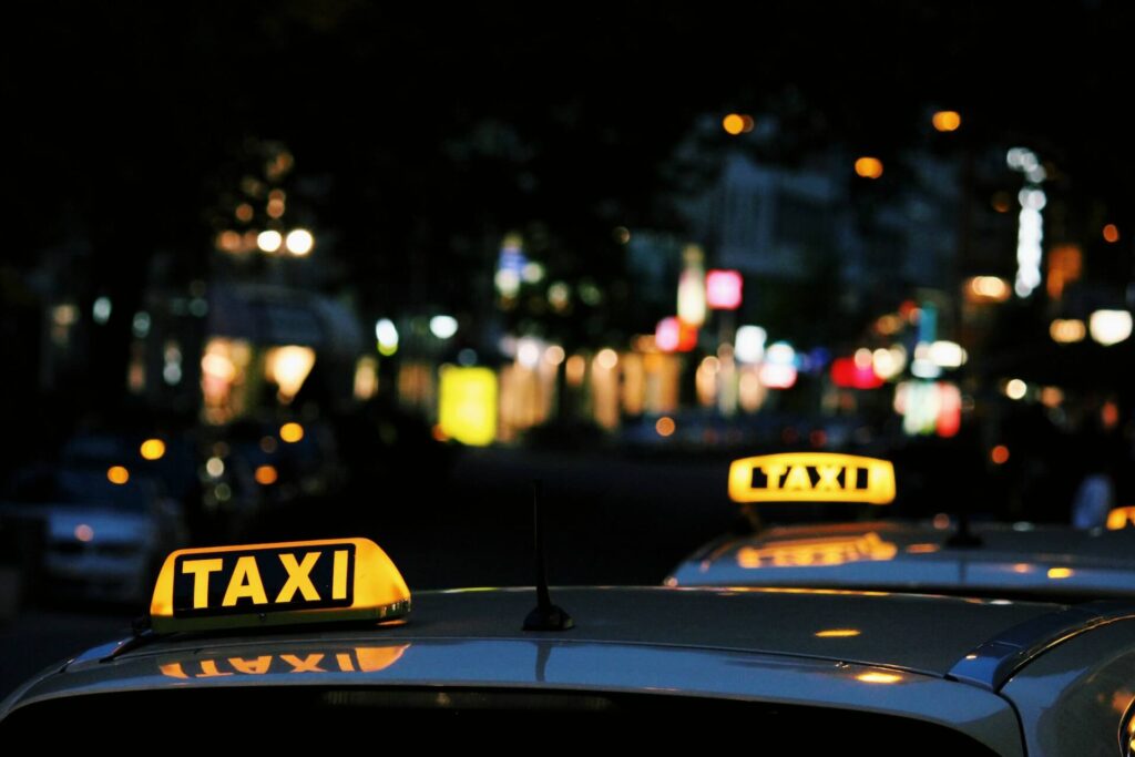 Taxi lights illuminated at night 