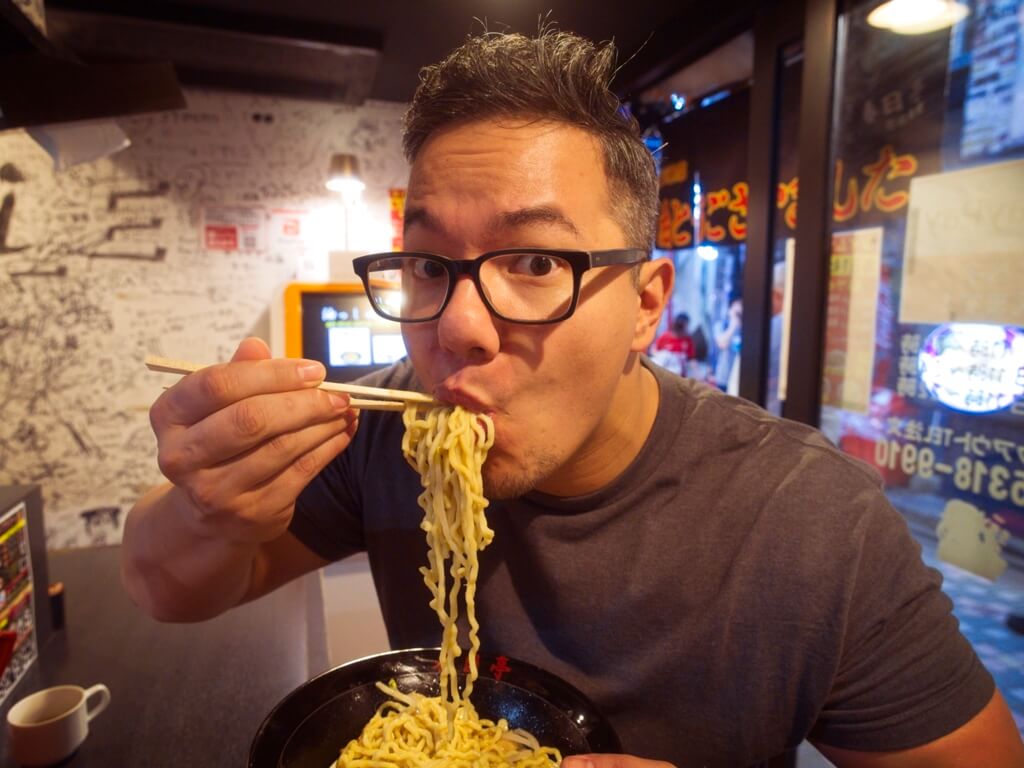 Me eating at Saikyou no Abura Soba Katsugatei